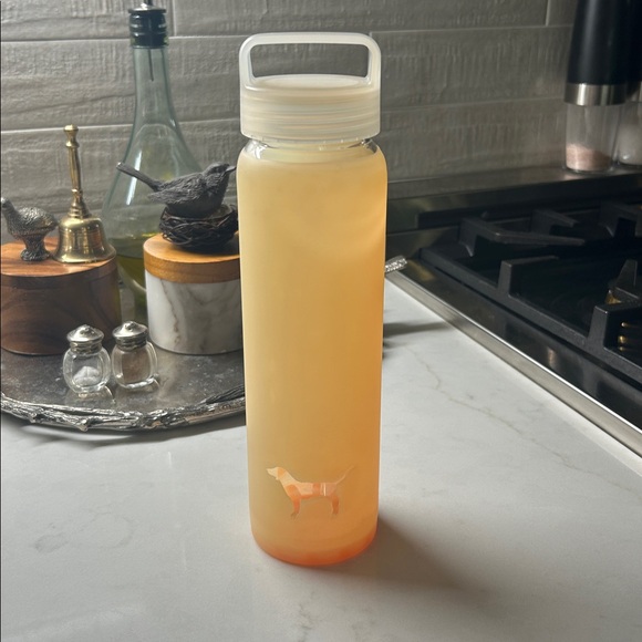 Pink Victoria’s Secret glass Water Bottle. With plastic top. Light orange color - Picture 2 of 3